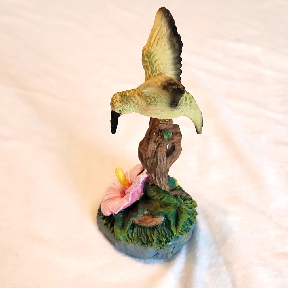 Handpainted resin hummingbird on wooden perch